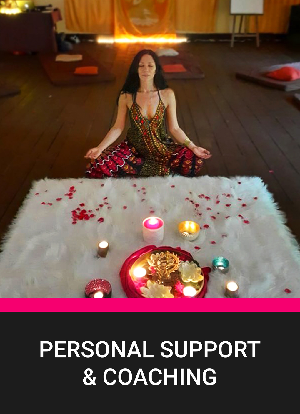 Mallika in a peaceful meditation pose sits in a cozy, candlelit space with a beautifully decorated altar in front of her, symbolizing personal support and coaching in a serene environment.